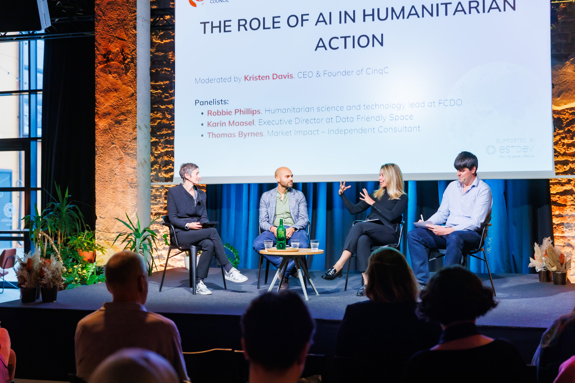 People sitting on a stage 